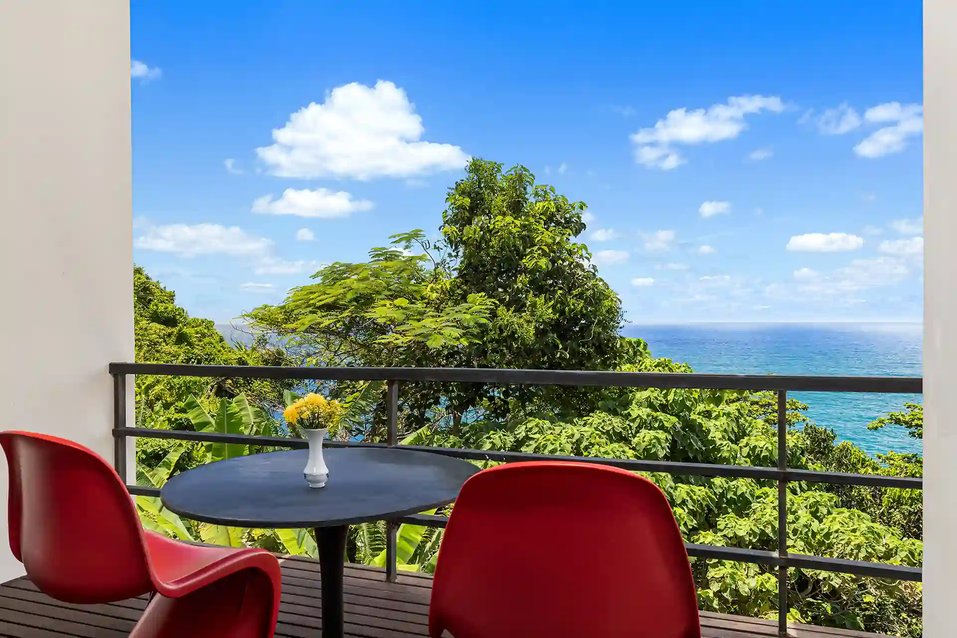 Villa Yin Kamala Headland intimate balcony bistro with blue sea backdrop