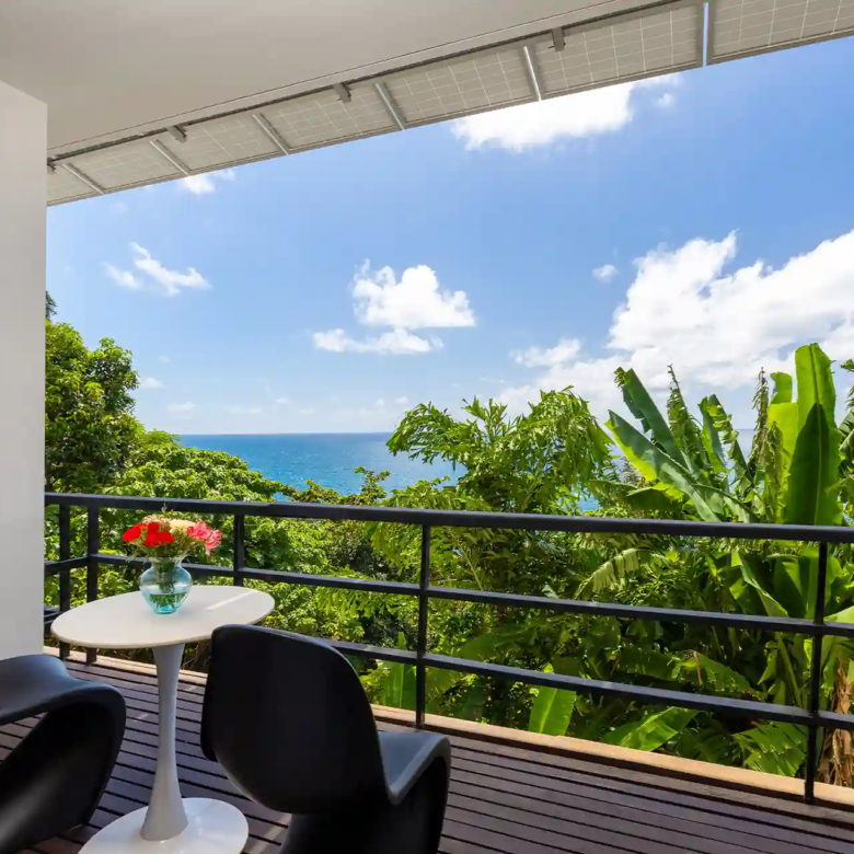 Villa Yin Kamala Headland balcony seating with tropical sea view