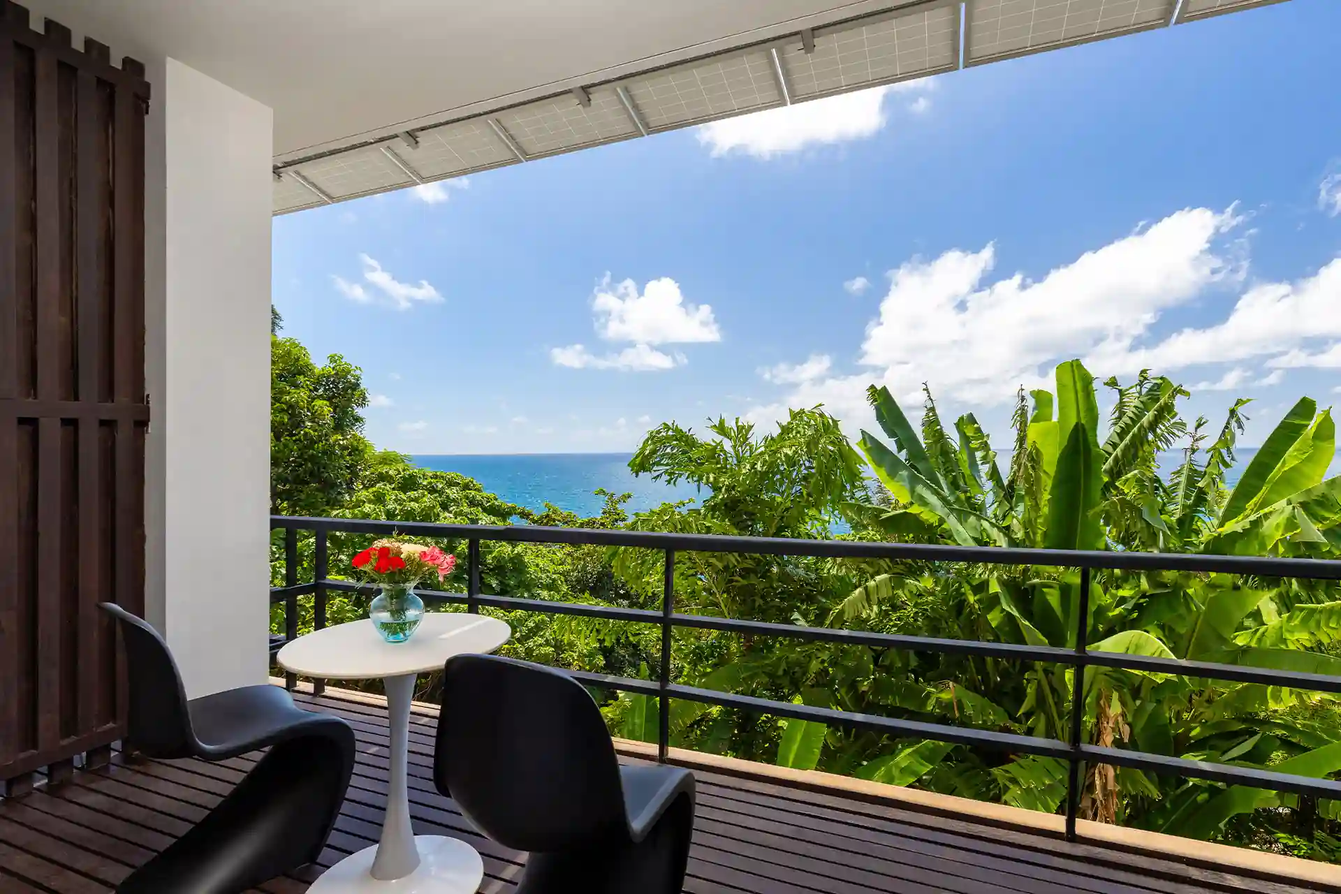 Villa Yin Kamala Headland balcony seating with tropical sea view
