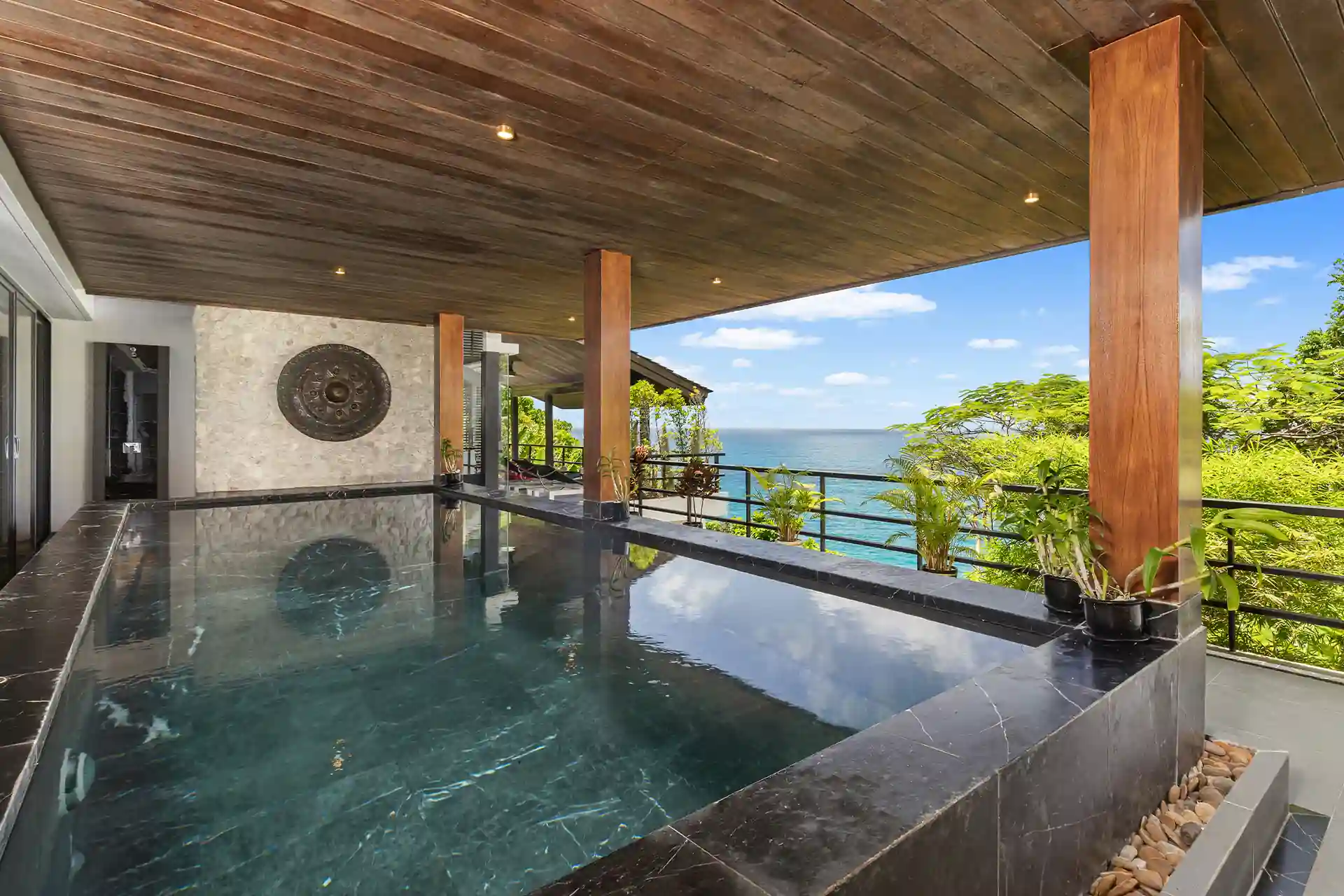 Villa Yin Kamala Headland covered marble pool with tranquil sea outlook