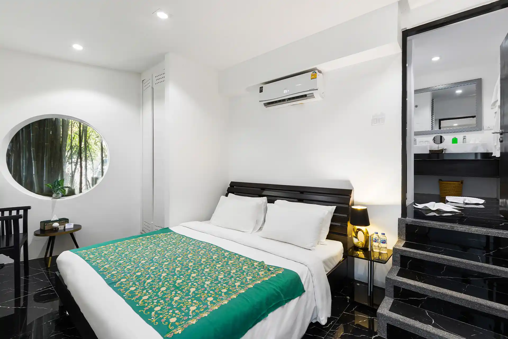 Villa Yin Kamala Headland intimate bedroom with garden window and ensuite