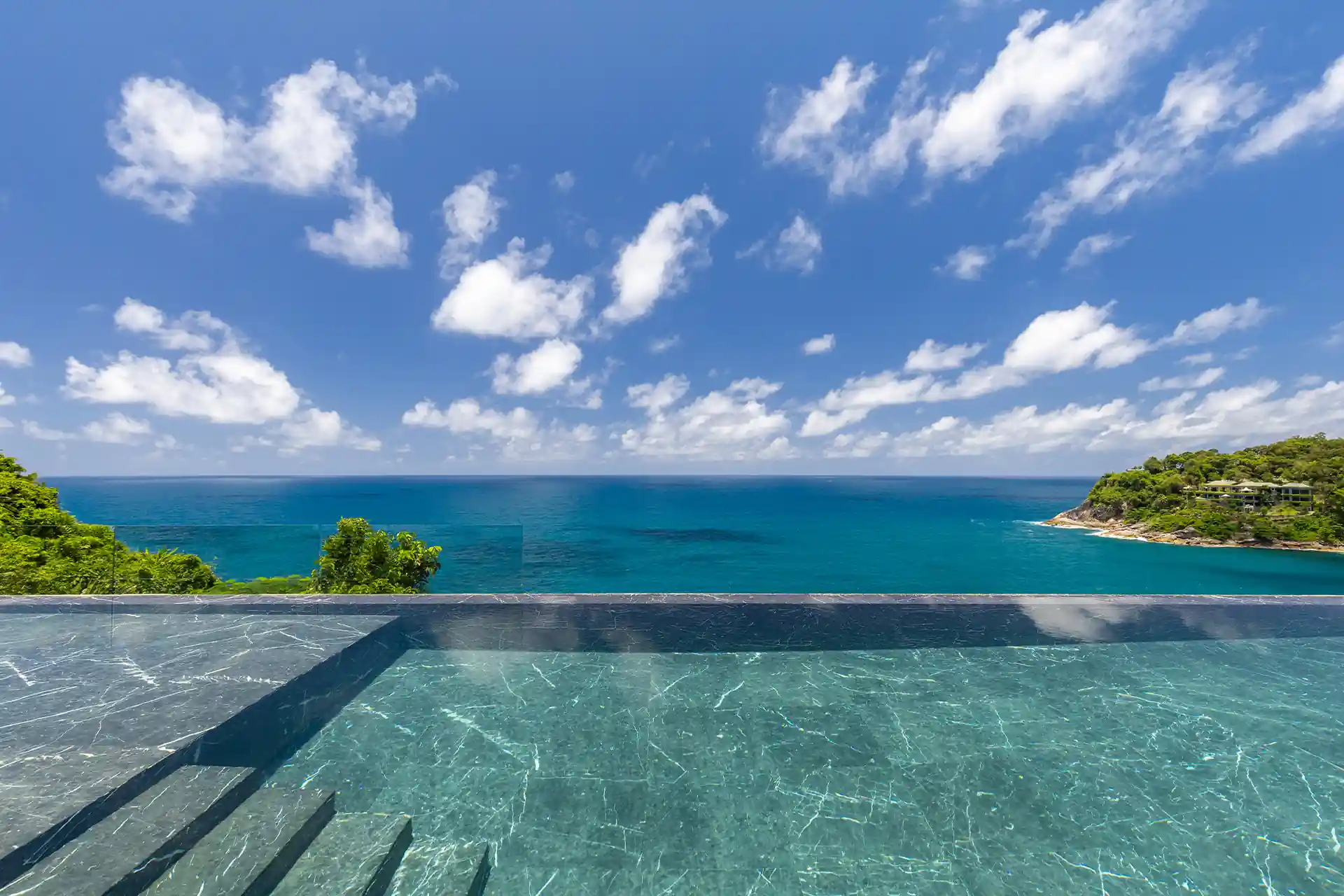 Villa Yin Kamala Headland infinity pool overlooking cove and coastline