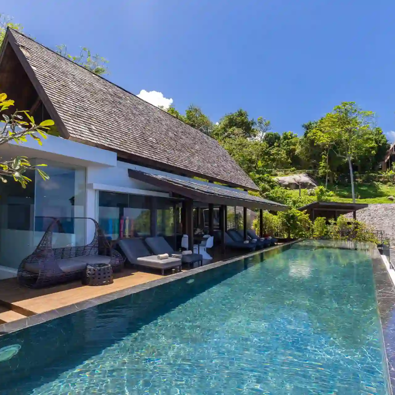 Villa Yin Kamala Headland long infinity pool beside pavilion and greenery