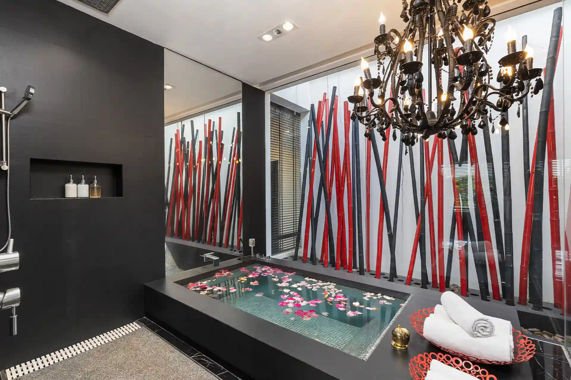 Villa Yin Kamala Headland spa bathroom with flower-filled soaking tub