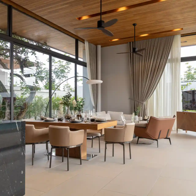 Botanica Four Season Thalang elegant dining area beside glass living wall