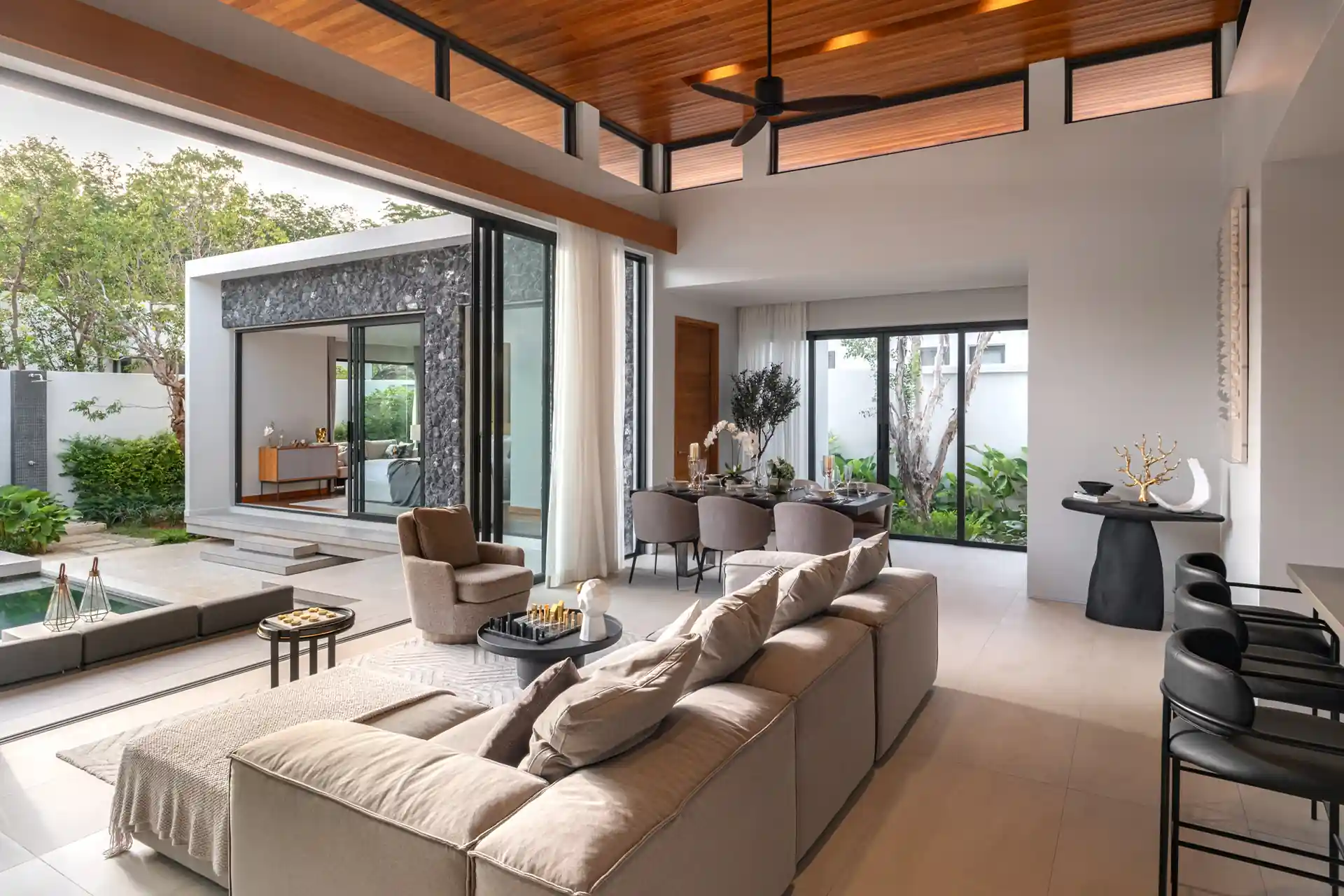 Botanica Four Season Thalang bright living dining area by pool