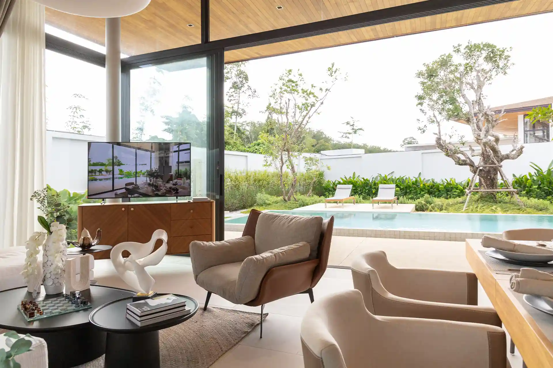 Botanica Four Season Thalang living room overlooking private lap pool