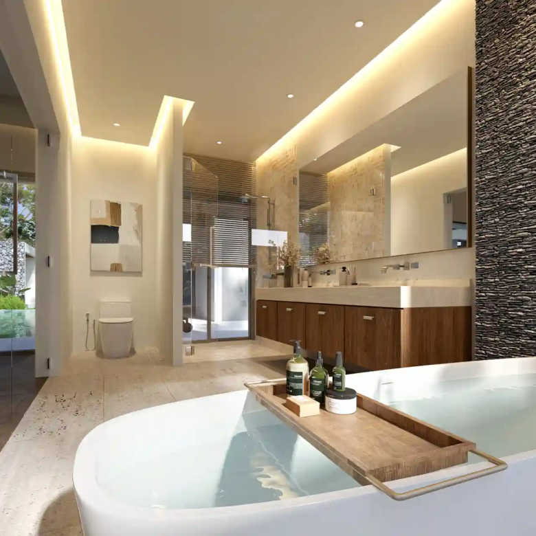 Botanica Four Season Thalang luxury bathroom with freestanding bathtub and stone wall
