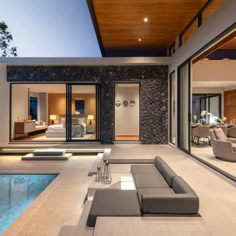 Botanica Four Season Thalang night pool terrace with bedroom and living room