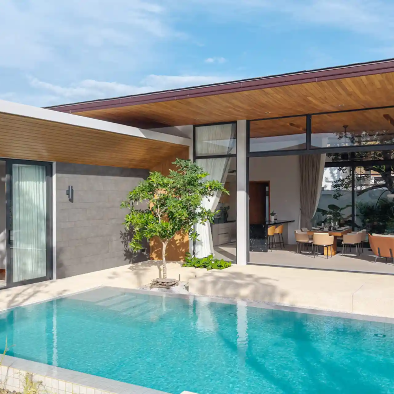 Botanica Four Season Thalang poolside pavilion with bedroom and dining area