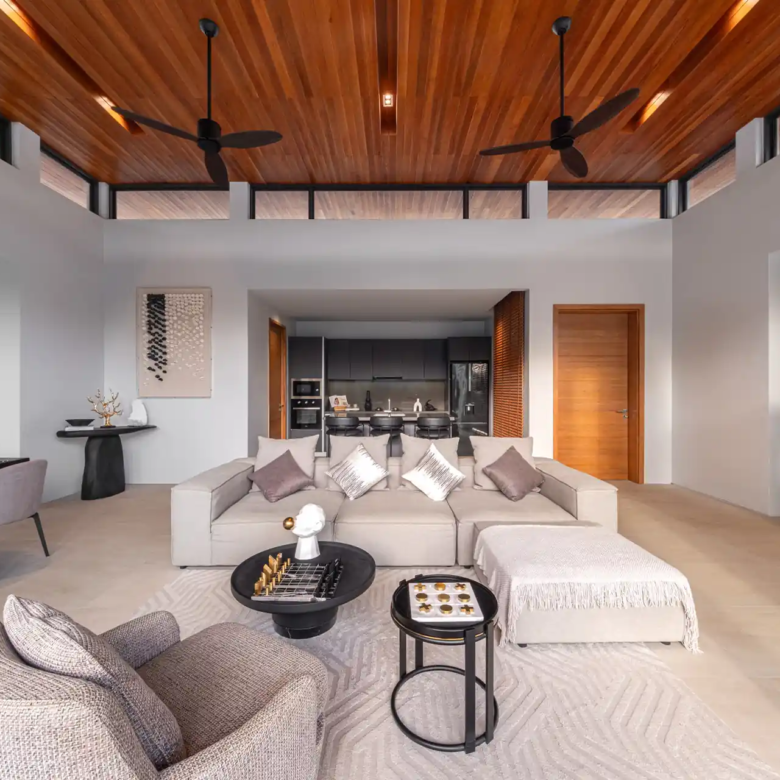Botanica Four Season Thalang spacious living room with modern kitchen
