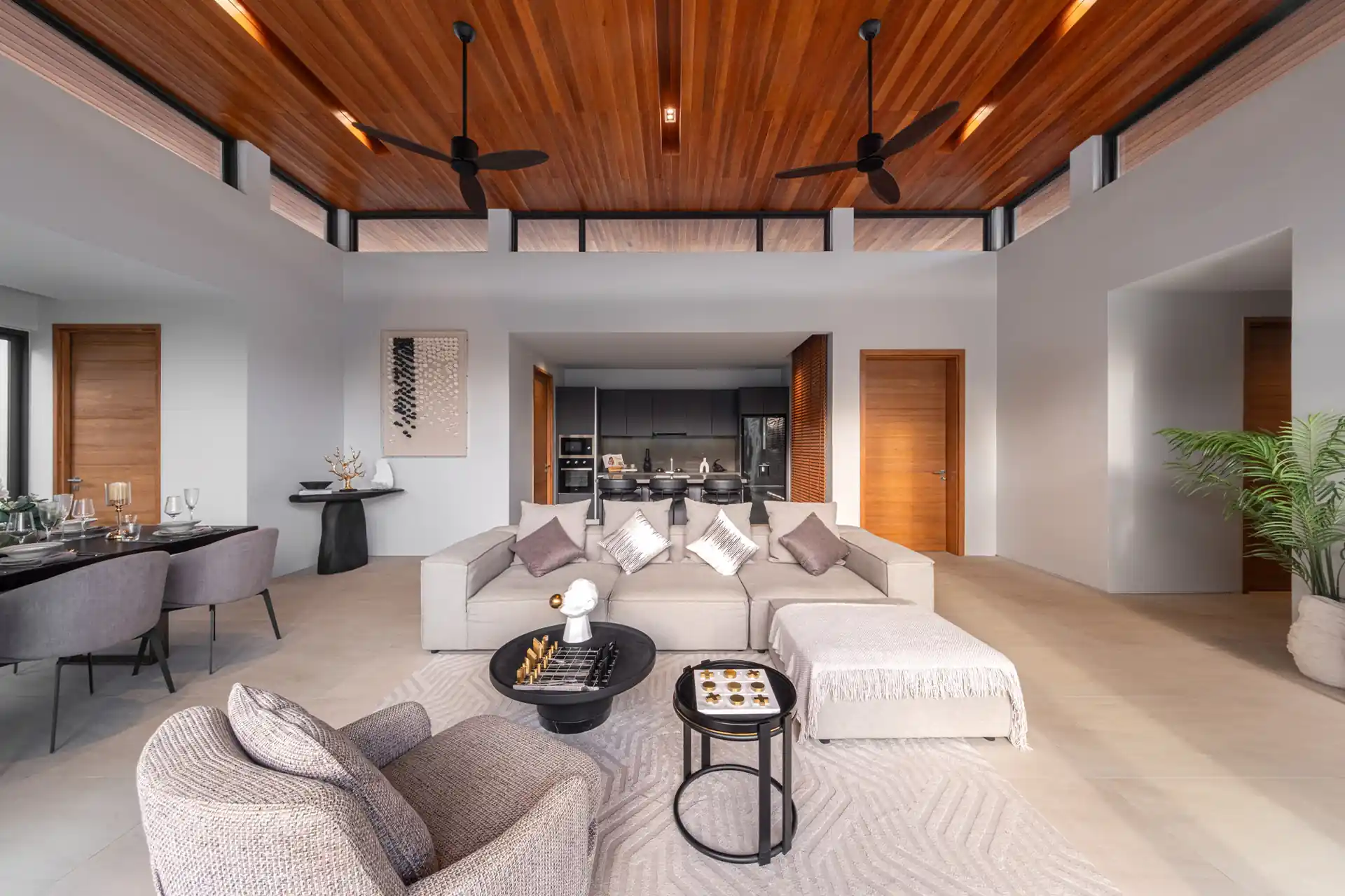 Botanica Four Season Thalang spacious living room with modern kitchen