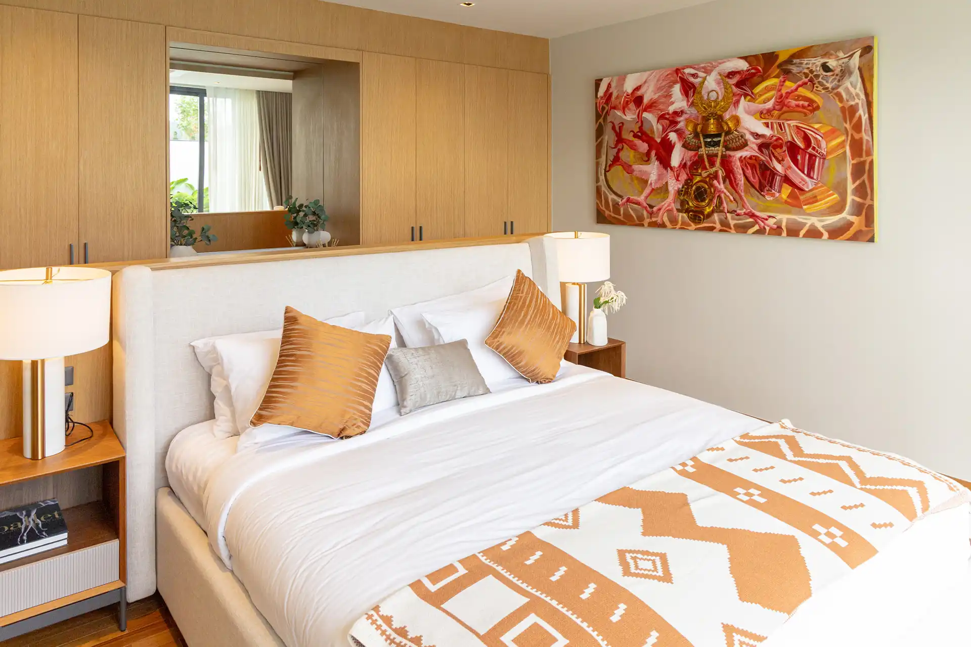 Botanica Four Season Thalang warm-toned bedroom with large feature wall artwork