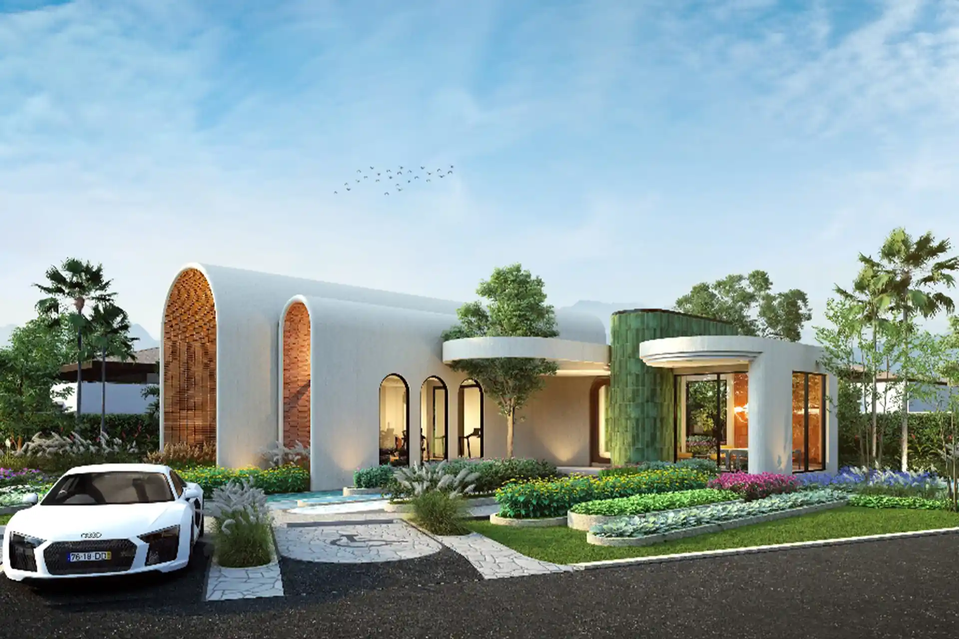 Botanica Pru Jampa Pool Villas clubhouse frontage with landscaped gardens