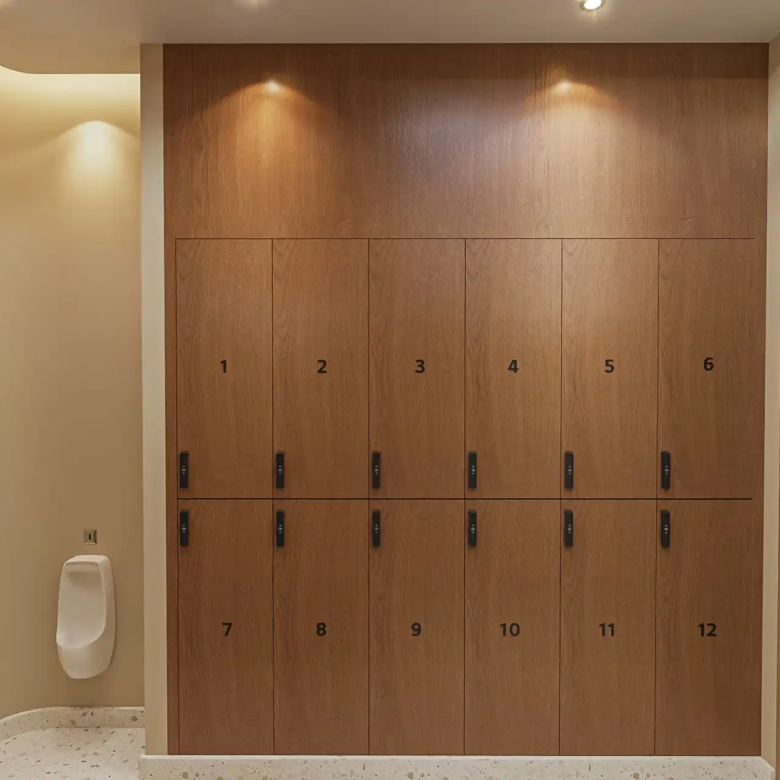 Botanica Pru Jampa Pool Villas numbered wooden lockers in clubhouse restroom