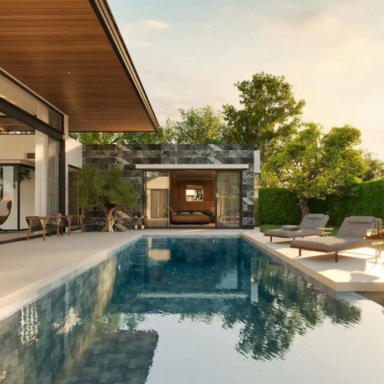 Botanica Pru Jampa Pool Villas long lap pool and sunbeds