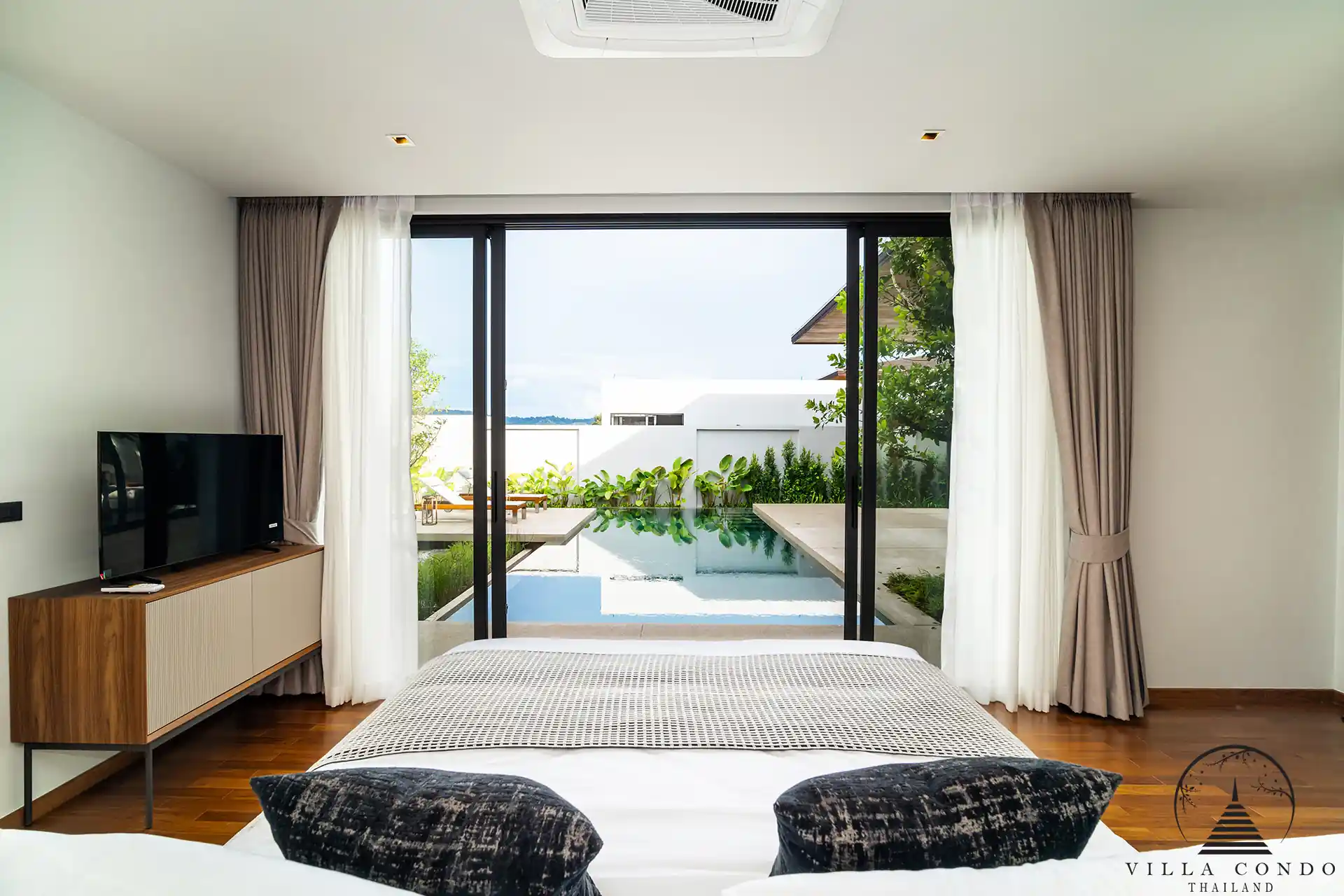 Pool-view bedroom at Botanica Wisdom near UWC International School Botanica Wisdom near UWC International School bedroom overlooking private pool