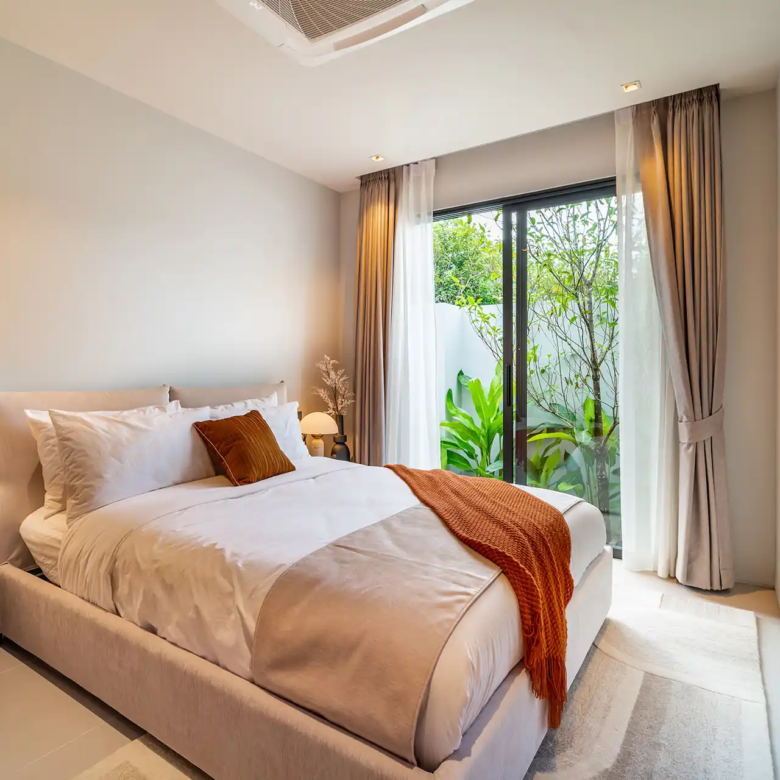 Botanica Wisdom near UWC International School cozy guest bedroom with garden access