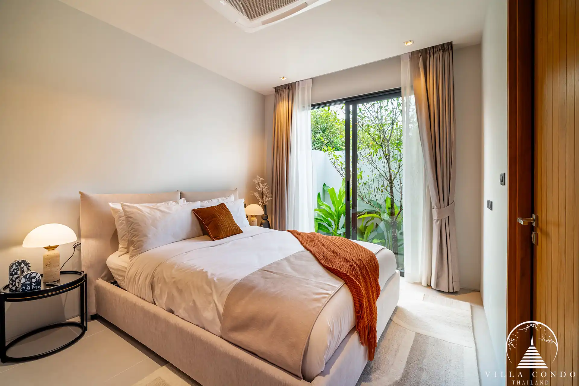 Cozy garden-access guest bedroom at Botanica Wisdom near UWC Botanica Wisdom near UWC International School cozy guest bedroom with garden access