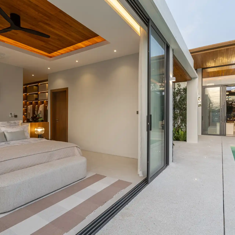 Mouana Cherng Talay master bedroom opening directly onto private swimming pool