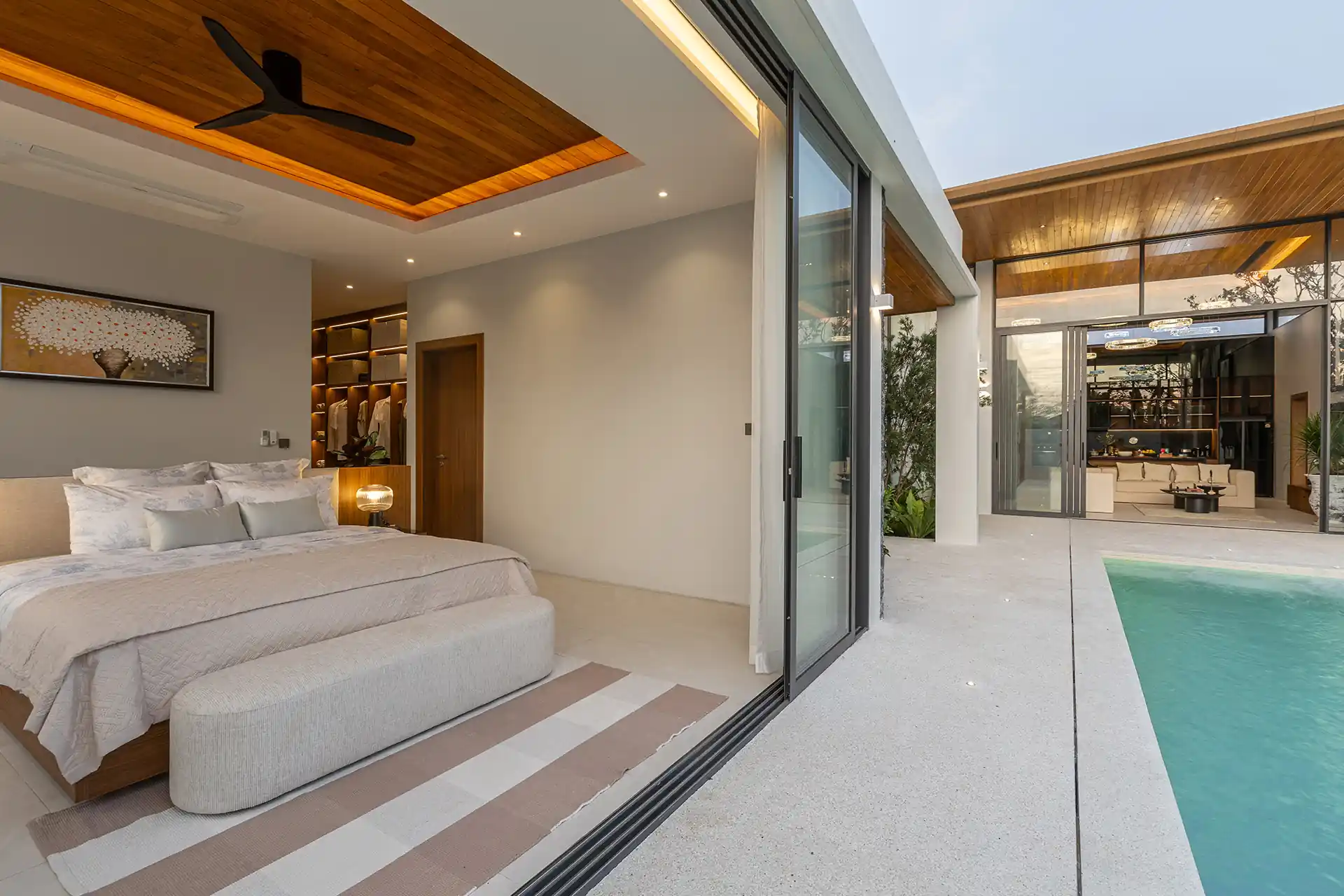 Mouana Cherng Talay master bedroom opening directly onto private swimming pool