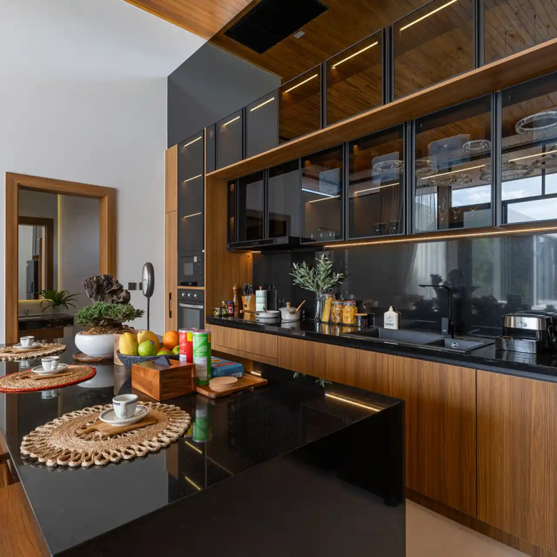 Mouana Cherng Talay designer kitchen with long counter and bar stools