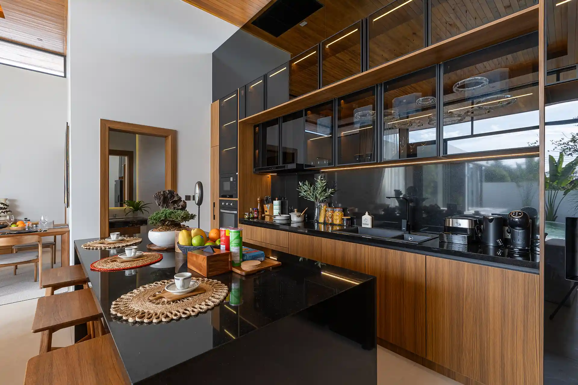 Mouana Cherng Talay designer kitchen with long counter and bar stools
