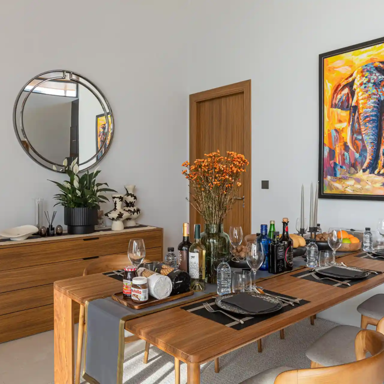 Mouana Cherng Talay stylish dining corner with modern elephant artwork