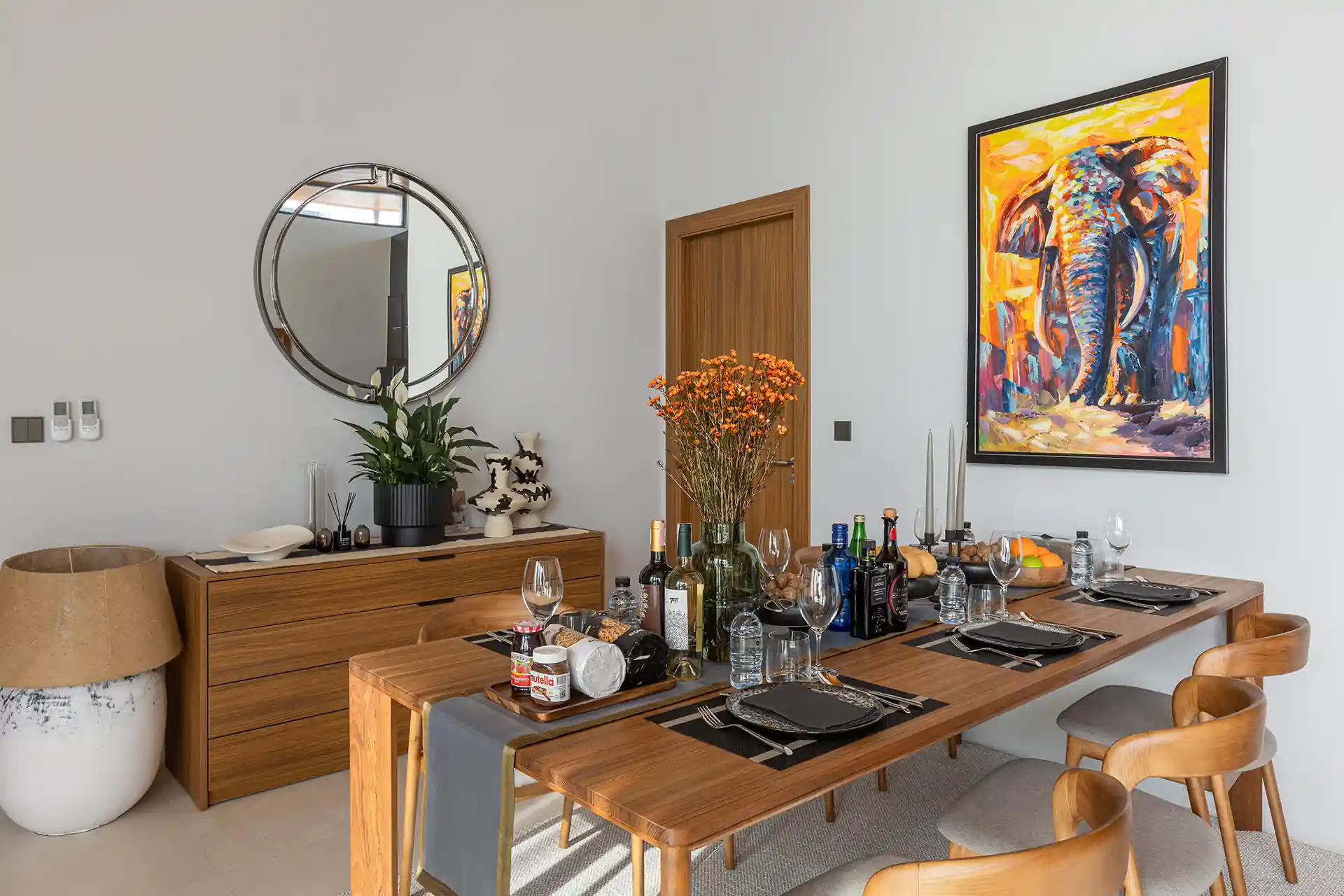 Mouana Cherng Talay stylish dining corner with modern elephant artwork