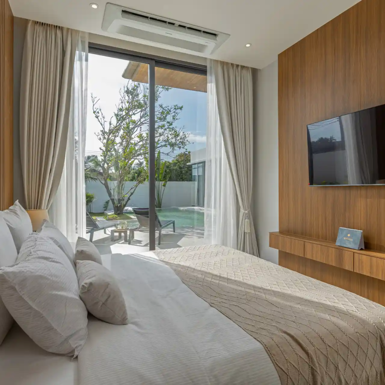 Mouana Cherng Talay bedroom opening to pool terrace and sun loungers