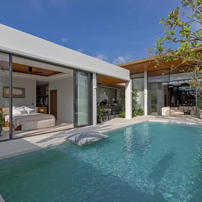 Mouana Cherng Talay pool beside glass-front master bedroom pavilion