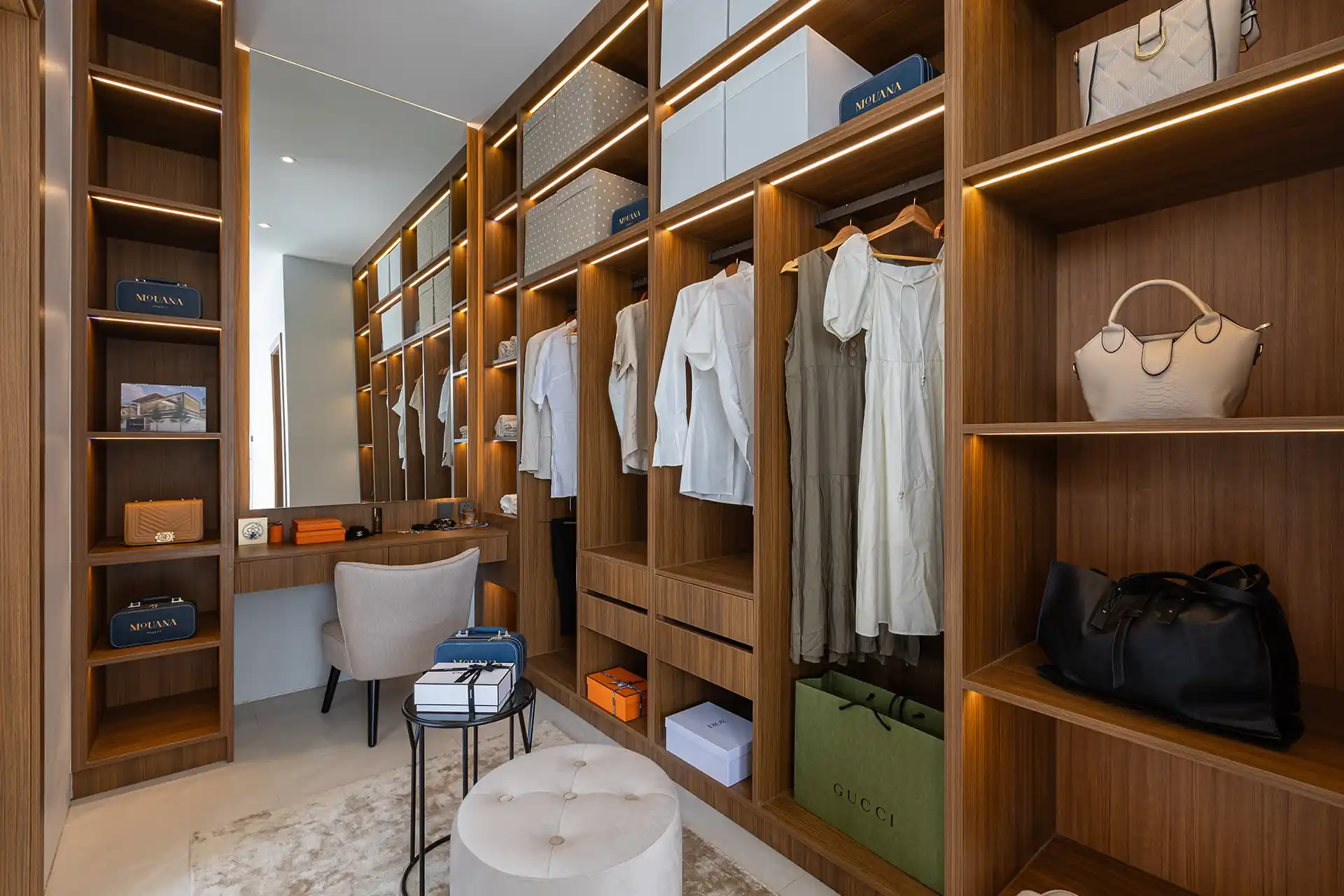 Mouana Cherng Talay walk-in wardrobe with illuminated shelves and vanity