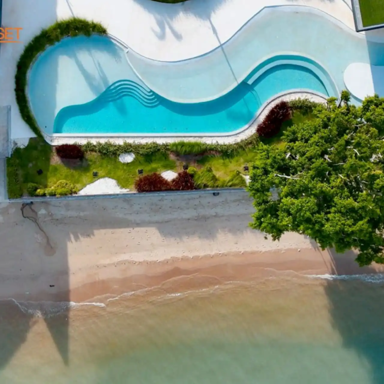 Sea Theatre Beachfront Rawai aerial beachfront pool beside Andaman shoreline