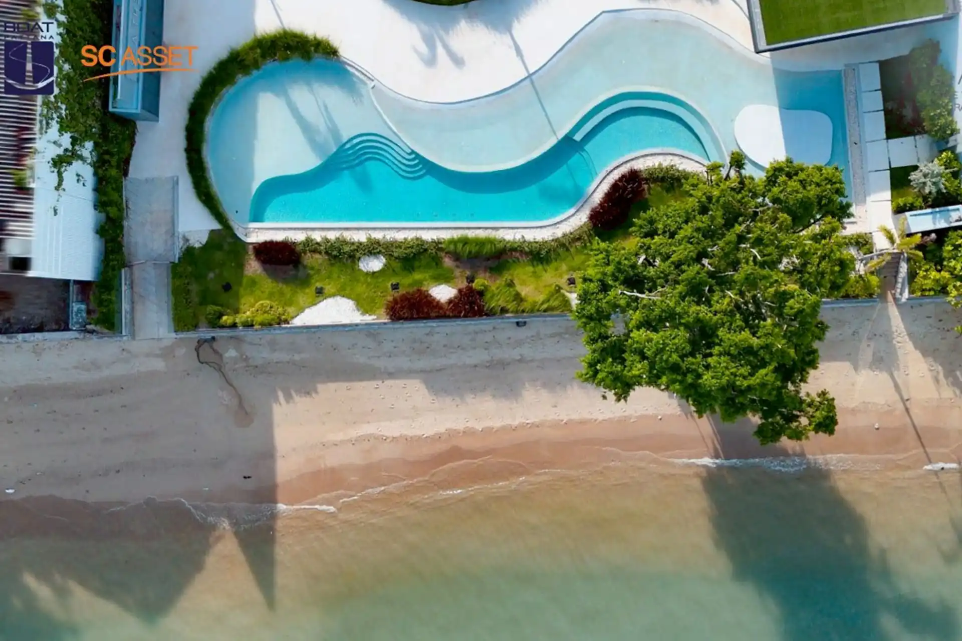 Sea Theatre Beachfront Rawai aerial beachfront pool beside Andaman shoreline