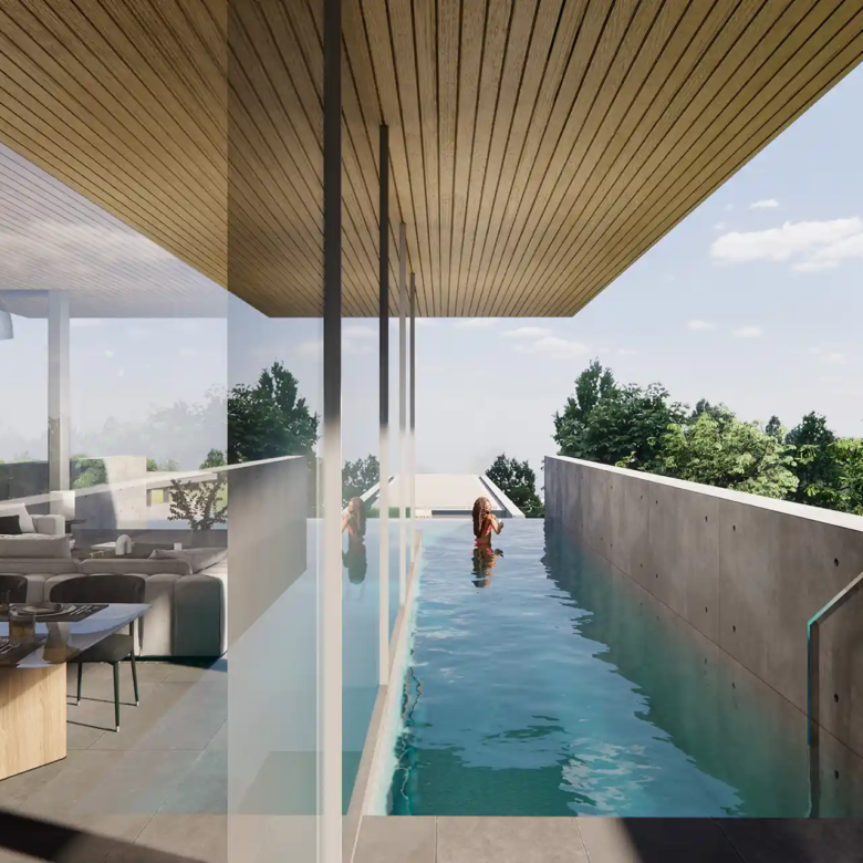 Sea Theatre Beachfront Rawai cantilever lap pool beside open living