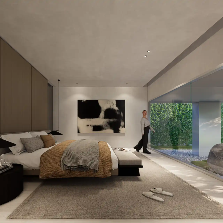 Sea Theatre Beachfront Rawai guest bedroom facing private courtyard garden and rocks