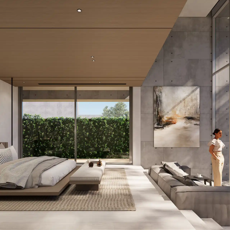 Sea Theatre Beachfront Rawai master bedroom suite with sofa and garden view