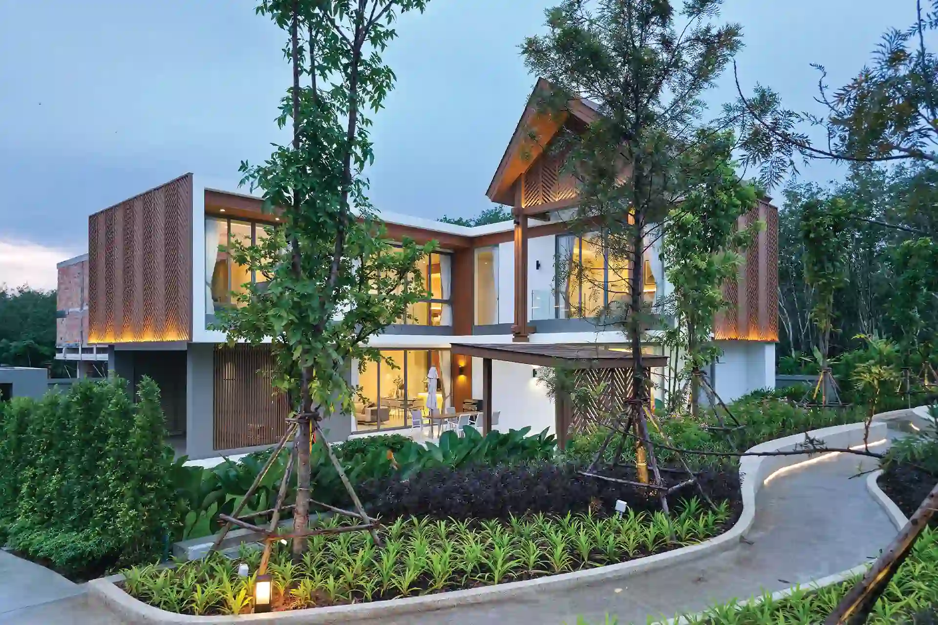 Serene Raya Bangjo corner angle of pool villa with landscaped tropical garden