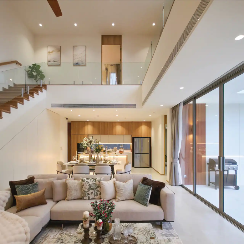 Serene Raya Bangjo double-height living and dining with pool view