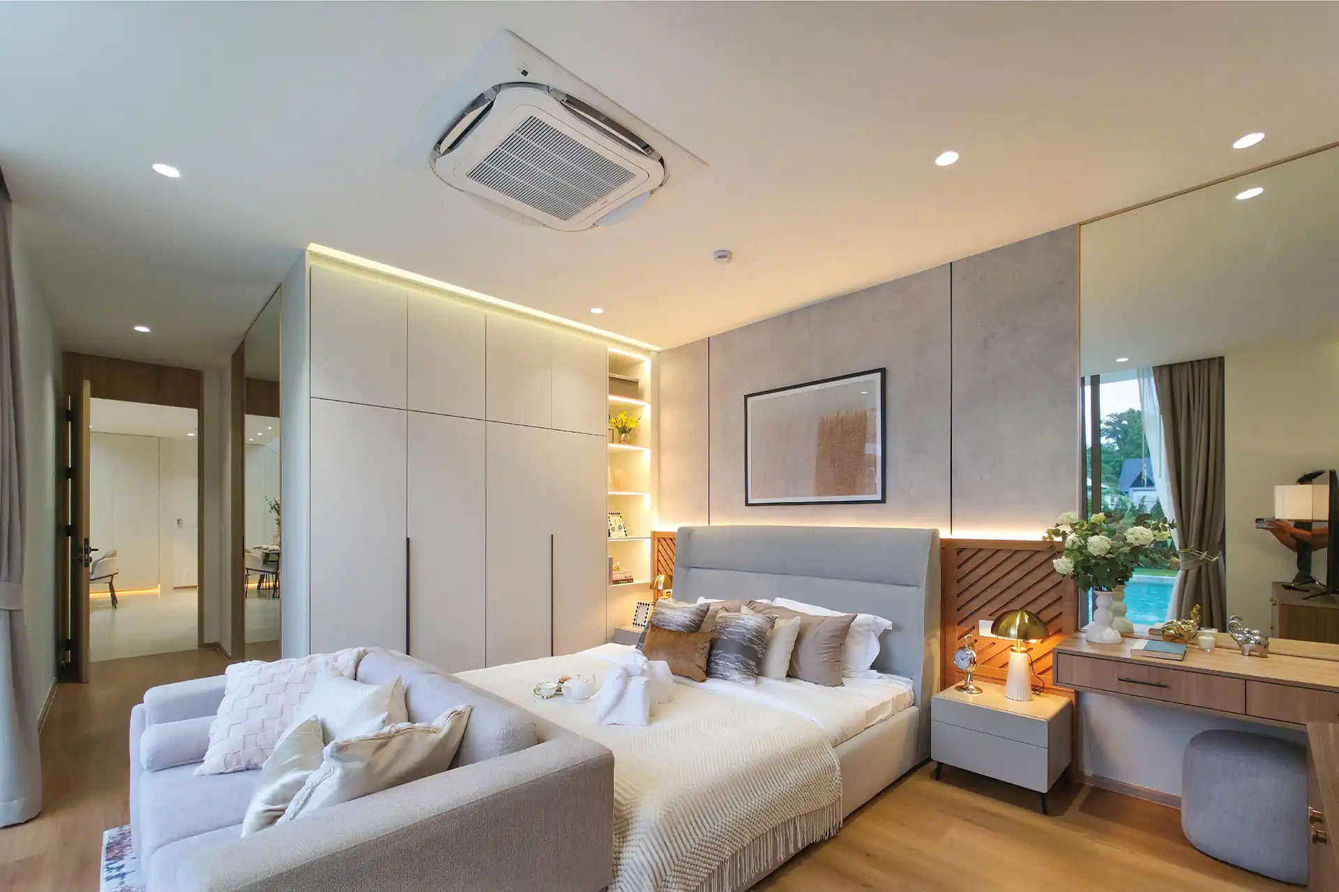 Serene Raya Bangjo cozy guest bedroom suite with sofa and vanity area