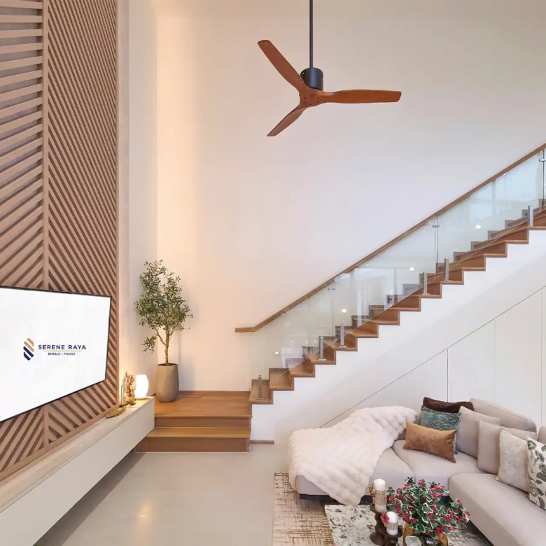 Serene Raya Bangjo stylish living room with wood feature wall and staircase