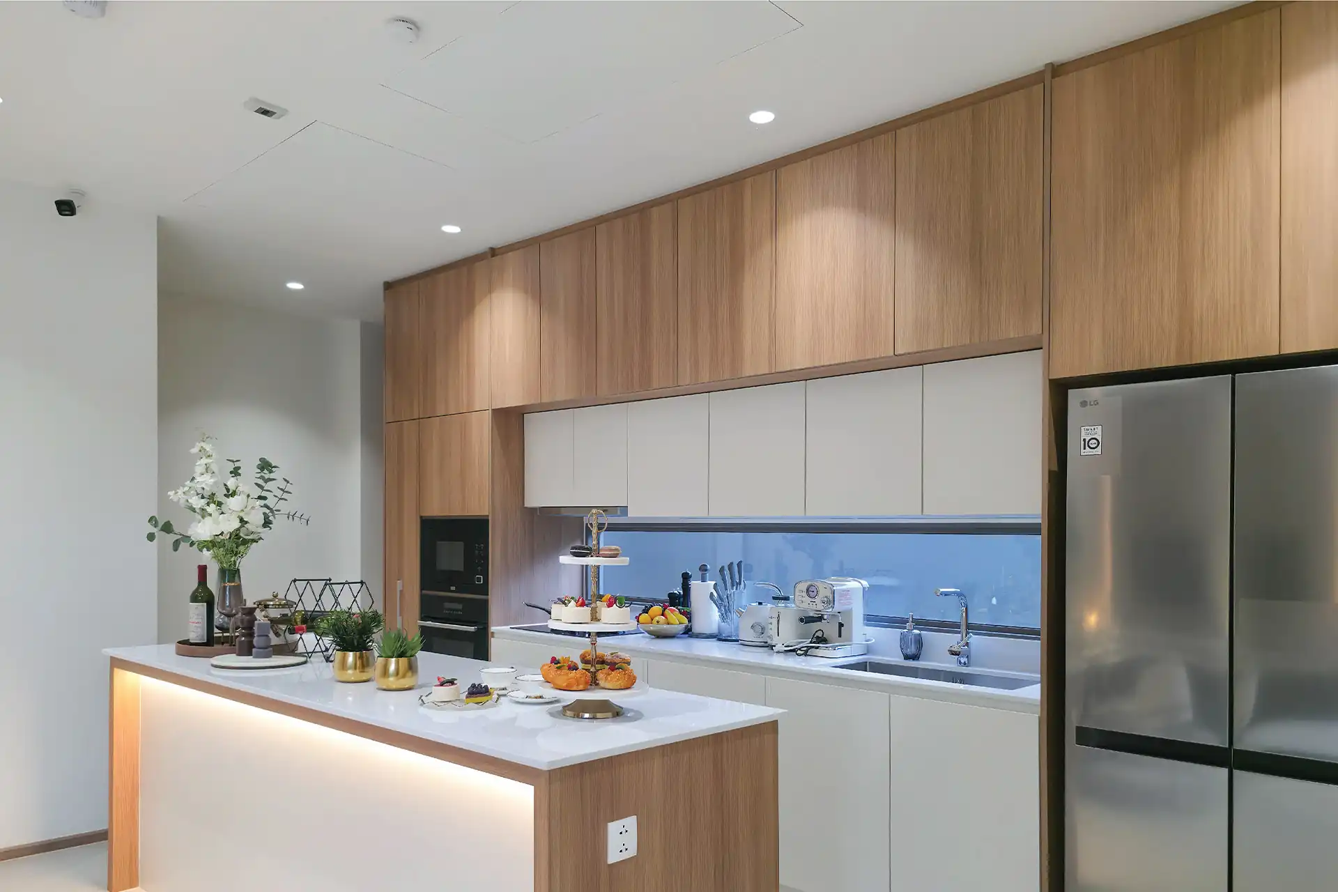 Serene Raya Bangjo modern built-in kitchen with island and premium appliances