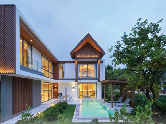 Serene Raya Bangjo modern pool villa exterior at twilight in Phuket