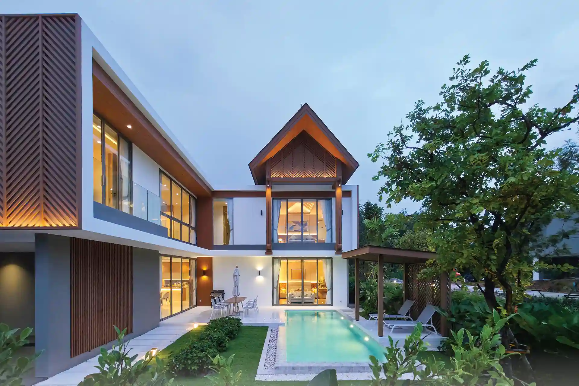 Serene Raya Bangjo modern pool villa exterior at twilight in Phuket