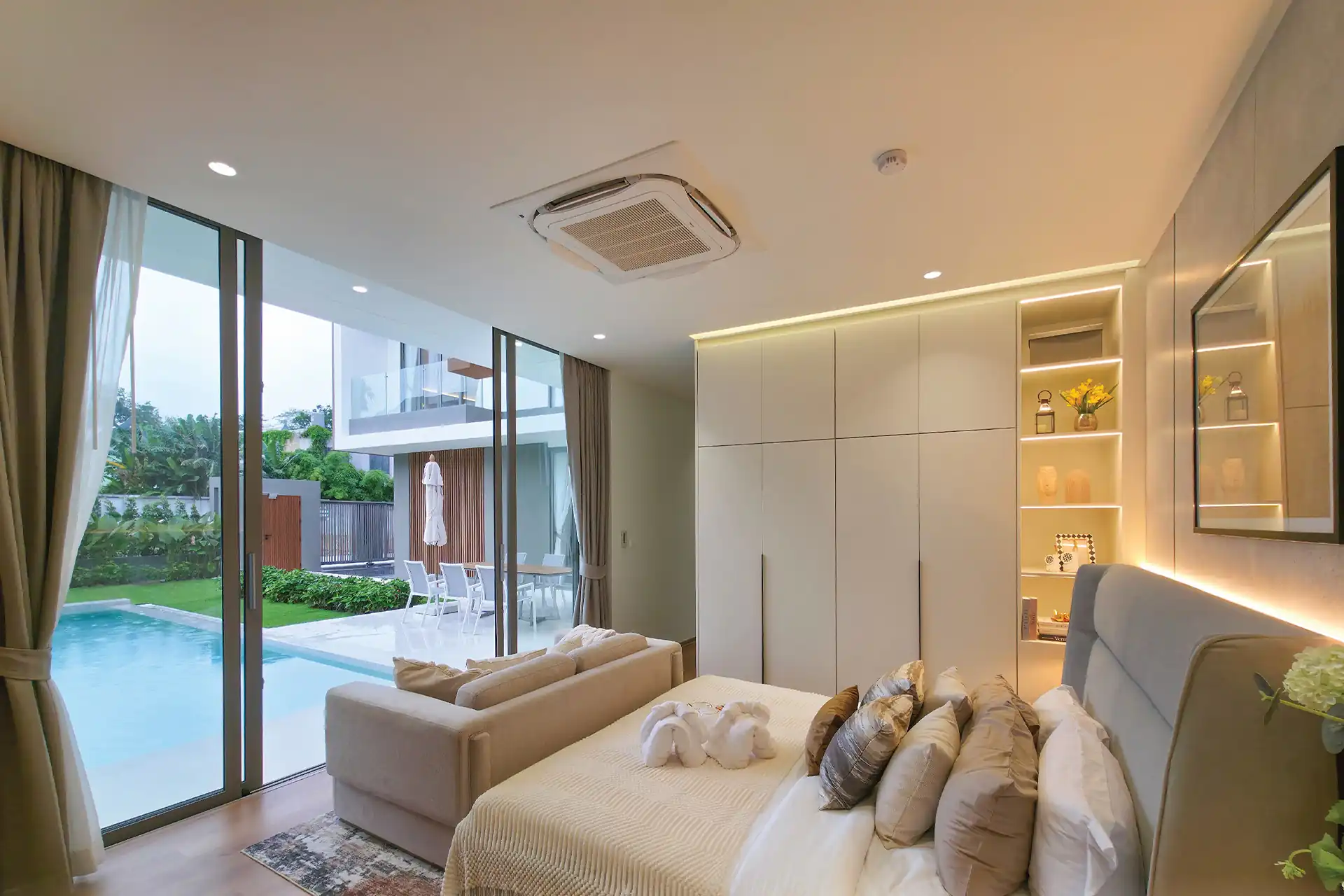 Serene Raya Bangjo bedroom with direct pool access and garden views