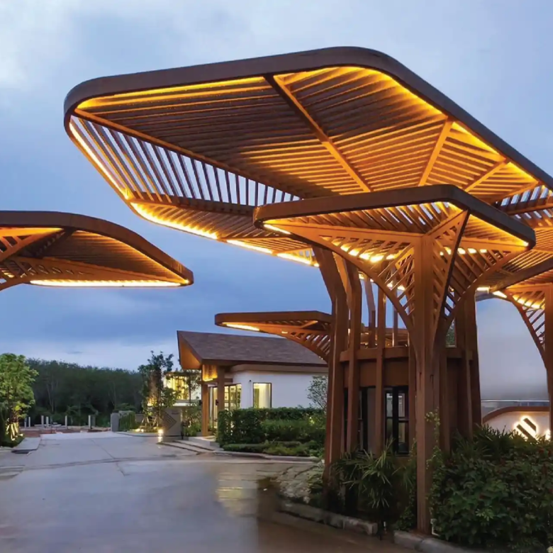 Serene Raya Bangjo signature entrance gate with sculptural canopy and warm lights
