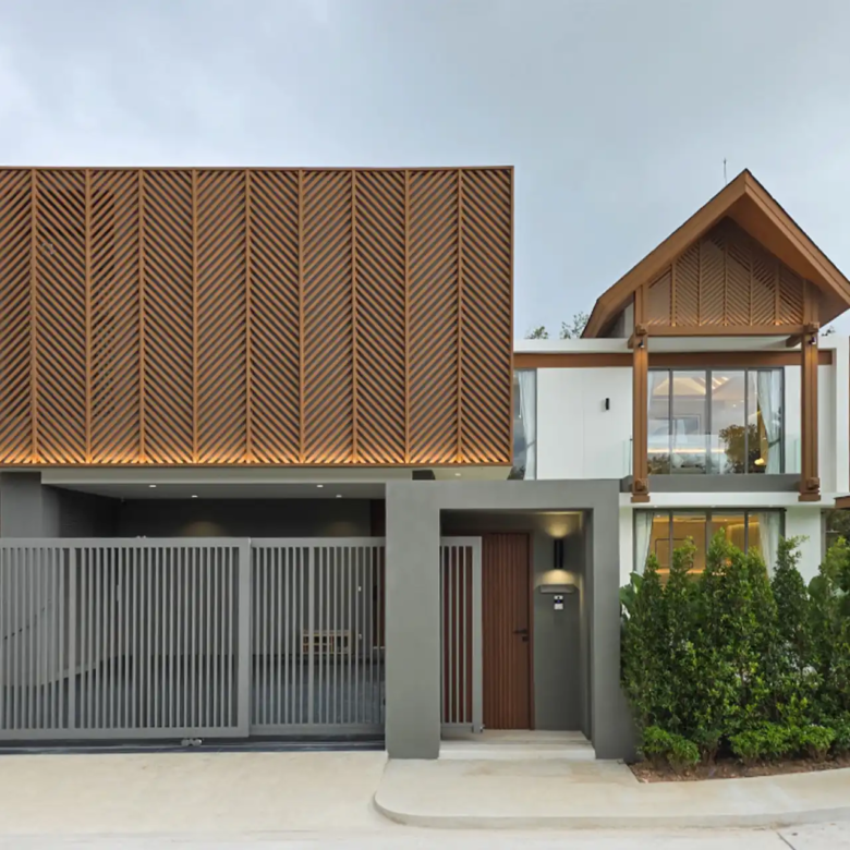 Serene Raya Bangjo contemporary street facade with gated carport and upper bedroom