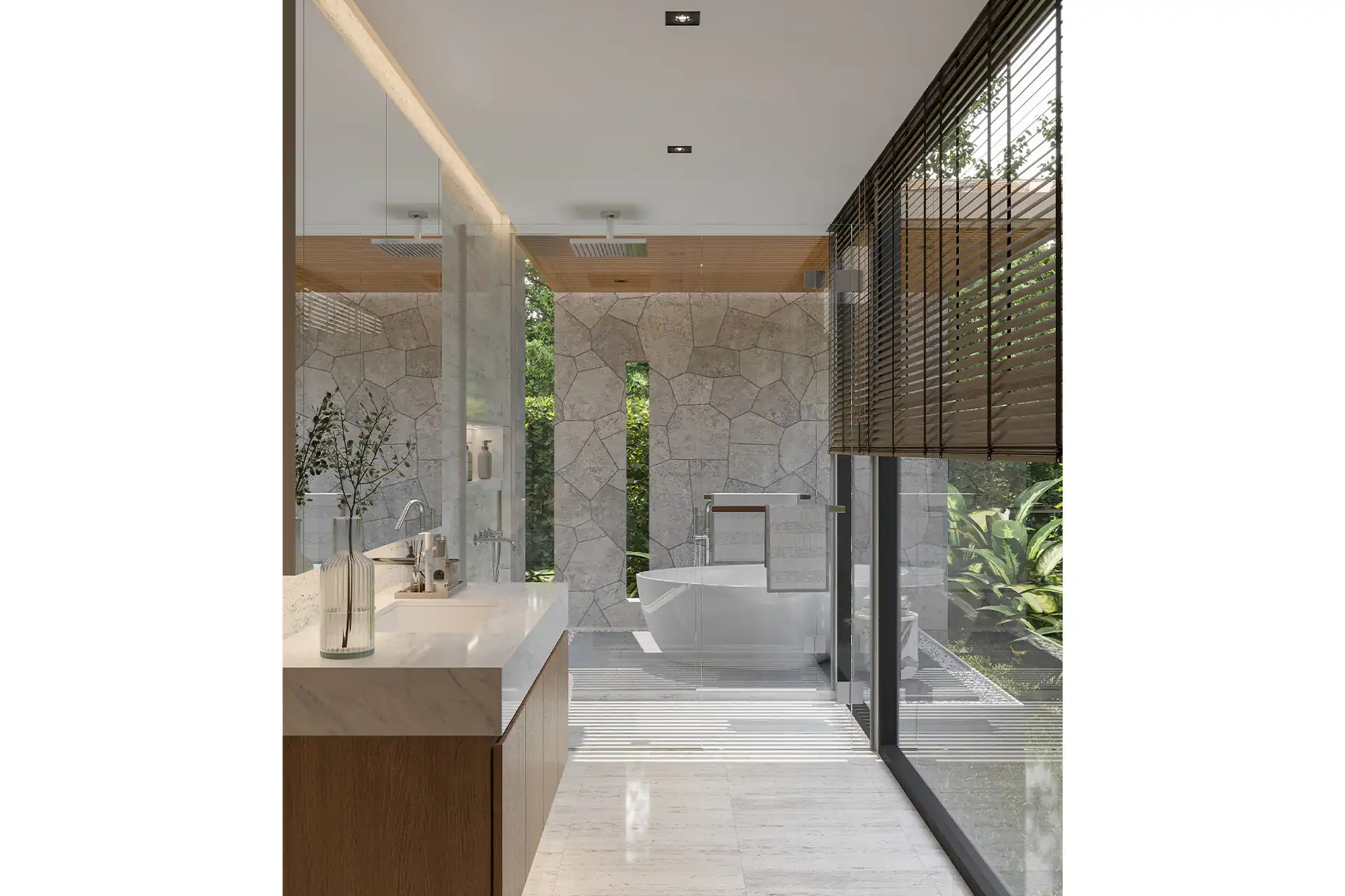 The Baya bathroom with freestanding bathtub and stone feature wall