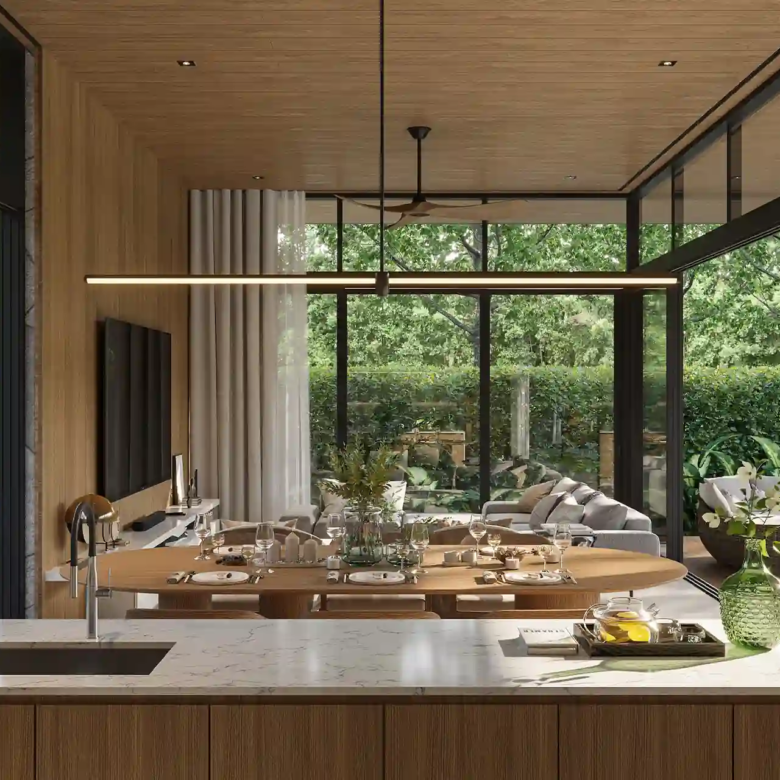 The Baya kitchen island and dining area with garden views