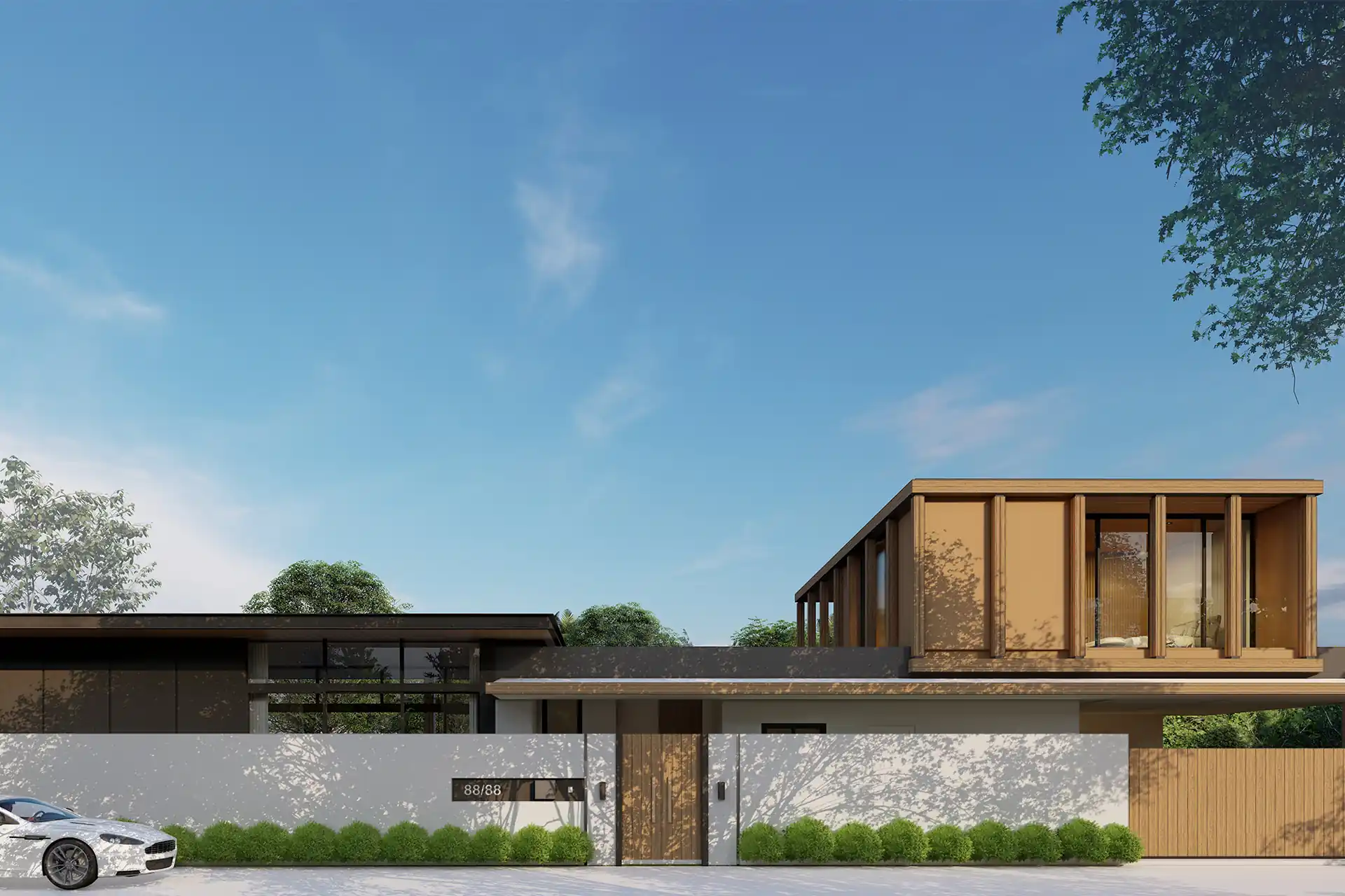 The Baya villa entrance facade with private gate and greenery